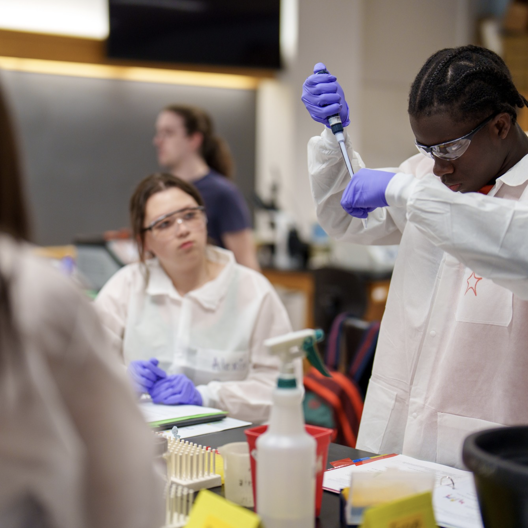 Photo meant to show students in a laboratory setting.